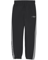 New Balance - Trackside Woven Pants - Lyst