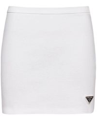 Prada - Minifalda con logo triangular - Lyst