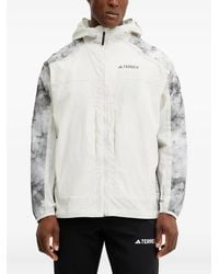 adidas - X National Geographic Wind.Rdy Hooded Marble-Print Jacket - Lyst