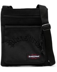 Eastpak X Raf Simons 'sleek Sling' Crossbody Logo Embellished Bag