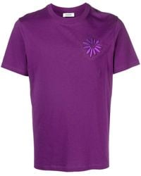 Sandro - T-Shirt mit Blumen-Prägung - Lyst