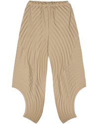 Issey Miyake - Beige Curved Pleats Tapered Trousers - Lyst