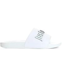 Just Cavalli - Logo-Lettering Slides - Lyst