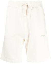 1017 ALYX 9SM - Pantalones cortos de deporte con logo estampado - Lyst