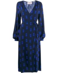 La DoubleJ Wikkeljurk Met Bloemenprint - Blauw