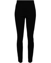 Moncler - Fitted Stretch Pants With Zipper - Lyst