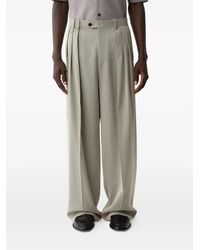 Calvin Klein - Pinstripe-Pattern Pleated Trousers - Lyst
