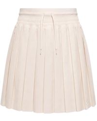 Nike - Pleated Logo-Detail Mini Skirt - Lyst