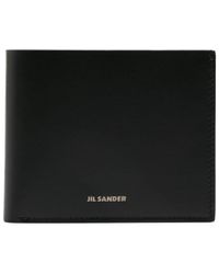 Jil Sander - Portafoglio bi-fold con logo goffrato - Lyst