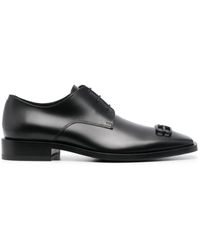 Balenciaga - Logo-embossed Leather Derby Shoes - Lyst