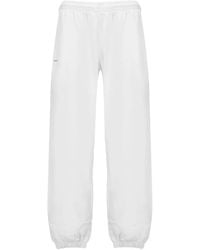PANGAIA - Elasticated Text-Print Track Pants - Lyst