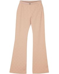 Givenchy - 4G-Jacquard Flared Trousers - Lyst