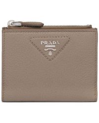 Prada - Logo-engraved Leather Bi-fold Wallet - Lyst