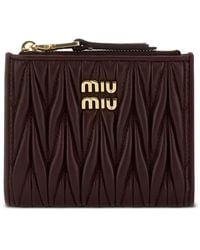 Miu Miu - Portefeuille Zippé Matelassé À Plaque Logo - Lyst