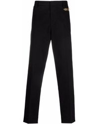 Moschino - Logo Embellished Tailored Trousers - Lyst