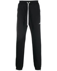 Amiri - Logo-Embroidered Track Pants - Lyst