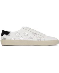 Saint Laurent - Sneakers in pelle bianca con stelle metalliche - Lyst