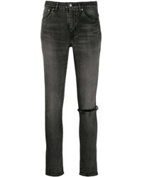 Saint Laurent Gescheurde Skinny Jeans - Grijs