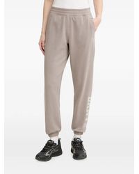 DKNY - 1989 Stud-Embellished Logo-Print Track Pants - Lyst