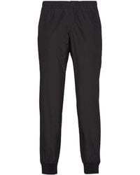 Prada - Pantalones de chándal con logo triangular - Lyst
