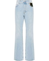 Séfr - Jeans svasati a vita alta con cut-out - Lyst