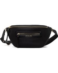 MICHAEL Michael Kors - Medium Logo-Plaque Pebbled-Leather Belt Bag - Lyst