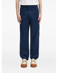 Carhartt - Logo-Patch Trousers - Lyst