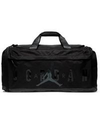 Nike - Velocity Logo-Print Holdall - Lyst