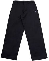 Champion - Hose mit Logo-Patch - Lyst