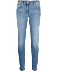 Versace - Low-rise Medusa Head-motif Skinny Jeans - Lyst