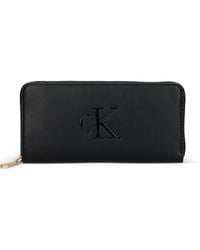 Calvin Klein - Embossed-Logo Wallet - Lyst