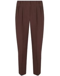 Brunello Cucinelli - Pleated Tapered Trousers - Lyst