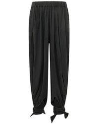 ANDAMANE - Noor Tied-Cuff Trousers - Lyst