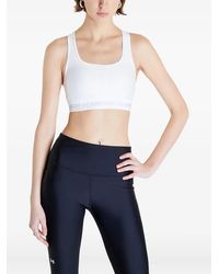 Under Armour - Crossback Mid Bra - Lyst