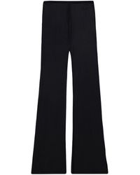 Courreges - Logo-embroidered Flared Trousers - Lyst