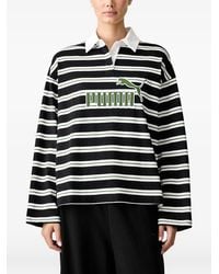 PUMA - Gestreept Poloshirt - Lyst