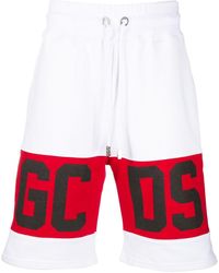 Gcds - Pantalones cortos de deporte con franjas laterales del logo - Lyst