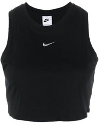 Nike - Top corto con logo bordado - Lyst
