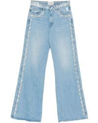 Coperni - Jeans mit Nieten - Lyst