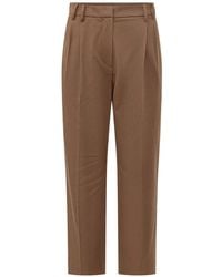 Brunello Cucinelli - Pleated Tapered Trousers - Lyst