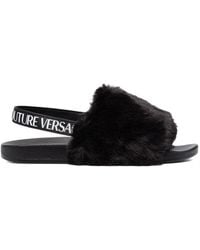 Versace - Sliders in gomma e pelliccia sintetica - Lyst