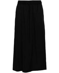 Julius - Loose Fit Pleated Trousers - Lyst