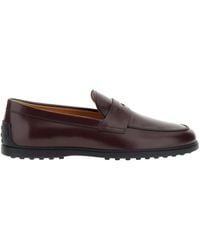 Tod's - Mocassins En Daim À Logo Embossé - Lyst