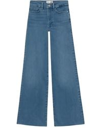 FRAME - Le Easy Flare Raw Jeans - Lyst