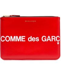 Portefeuilles et porte-cartes Comme des Garçons pour femme - Jusqu'à -40 %  sur Lyst.fr