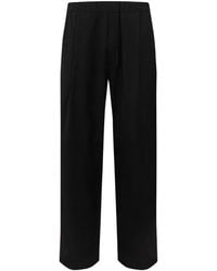 Laneus - Tapered-Fit Wool Trousers - Lyst