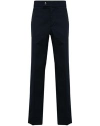 Moncler - Pantalones ajustados con detalle de rayas - Lyst