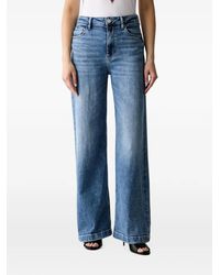 Guess - Bellagio Logo-Plaque Jeans - Lyst