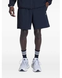 adidas - Tech Trefoil Essentials Shorts Met Logo - Lyst