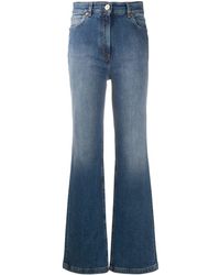 Versace Faded-effect Flared Jeans - Blue